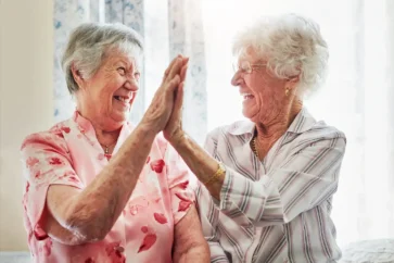 senior ladies giving a high five