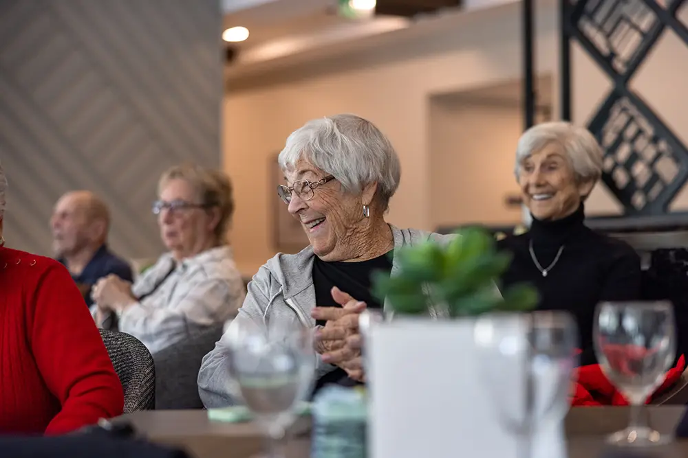 Woman smiling at other women